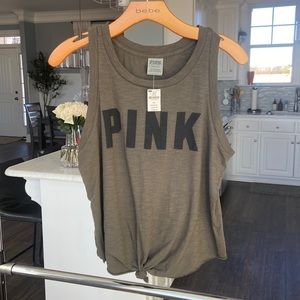 Womens PINK crop top in army green and in a size Small